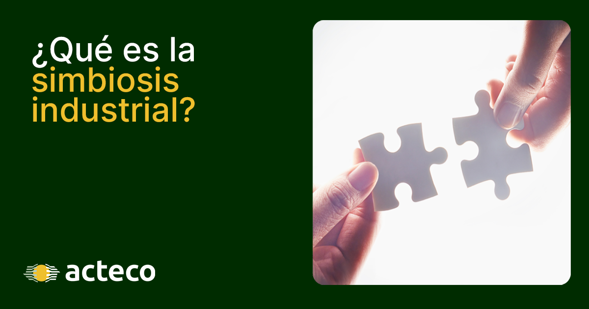 Banner del blog de Acteco con la pregunta "¿Qué es la simbiosis industrial?" y una imagen de dos manos uniendo piezas de puzzle, simbolizando la colaboración empresarial.